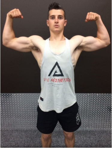 Image of Connor, flexing his muscles