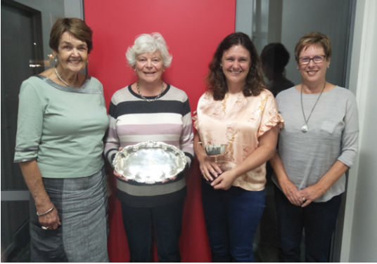 Image of Margaret Luisetti, Robin Hassall, Nikki Luisetti, Gaynor Hurford holding a silver plate